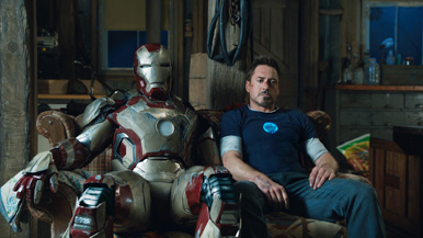 He's just taking a moment to reflect on all the money Iron Man has brought to Marvel/Disney.