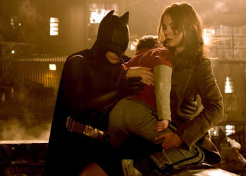 Aw, sleepy Tom Cruise is so cute. Batman and Katie help the lil guy to bed.